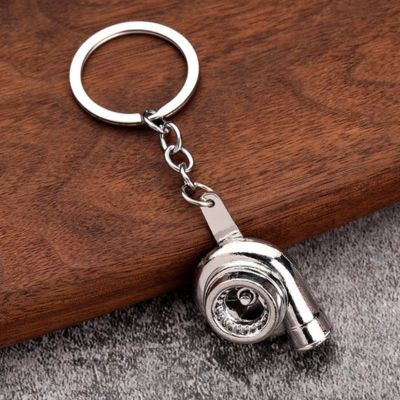 porte clé voiture turbo gris