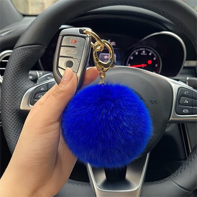 porte clés pompon bleu