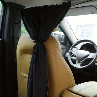 rideau_voiture_attaché_derrière_siège_conducteur